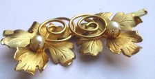 Broche dorée fin d'occasion Broche dorée fin d'occasion  Perros-Guirec