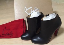 Christian louboutin short d'occasion  Expédié en Belgium