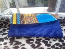 Yellow purple clutch for sale  MANCHESTER