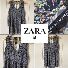 Robe fleurie décolleté d'occasion  Marcq-en-Barœul