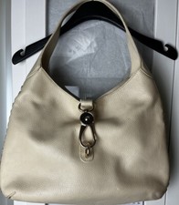 Bolso de hombro Dooney & Bourke Bone (beige) cuero con puntada a látigo con acentos dorados segunda mano  Embacar hacia Mexico