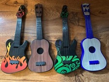 4 GUITARRAS MINIATURAS MULTICOLORIDAS TIPOS DIFERENTES  comprar usado  Enviando para Brazil