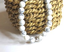 Bracelet perles howlite d'occasion Bracelet perles howlite d'occasion  Iguerande