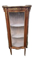 Vitrine galbée ornée d'occasion  Mer