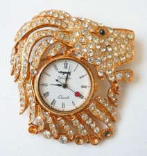 Broche montre quartz d'occasion  Paris IX