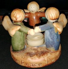 Three angels holding for sale  Deltona