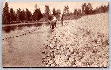 Usado, Cartão postal masculino RPPC puxando rede de pesca linha comprar usado  Enviando para Brazil