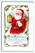 Cartão postal de Natal Papai Noel segurando lanterna e brinquedos série em relevo 314F G2 comprar usado  Enviando para Brazil