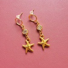 Gold tone earrings for sale  HULL