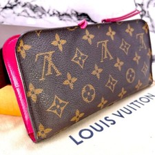 Louis vuitton porte d'occasion  Expédié en Belgium