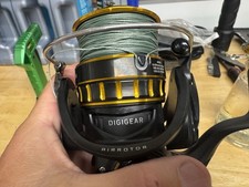Carretel de pesca DAIWA DIGEAR BG 4000 super bom ótima compra comprar usado  Enviando para Brazil