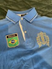 Camisa polo Tommy Hilfiger para hombre S/P bordada Brasil #8 azul Brasil segunda mano  Embacar hacia Argentina