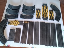 Lote de 34 pistas de carro caça-níqueis Life-Like 9" curva 15" obstáculo 15" pista de loop reto comprar usado  Enviando para Brazil