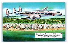 Cartão postal Eastern Super-C Constellation sobre Miami Beach, FL versão artística M5, usado comprar usado  Enviando para Brazil