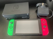 Console Nintendo Switch Joycons rosa e verde com carregador oficial + dock comprar usado  Enviando para Brazil