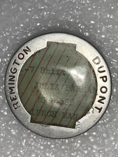 Distintivo de funcionário vintage Remington Dupont armas de fogo e munições "Homem-Almoço", usado comprar usado  Enviando para Brazil