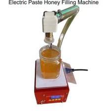 Máquina de llenado de miel de pasta eléctrica de 3 kg/5 kg llenado automático de líquidos de pesaje segunda mano  Embacar hacia Mexico