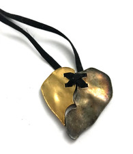 Collier métal doré d'occasion  Cernay