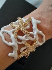 Enameled white cuff d'occasion Enameled white cuff d'occasion  Puteaux