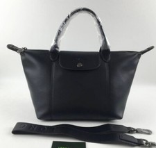 Longchamp pliage cuir d'occasion  Expédié en Belgium