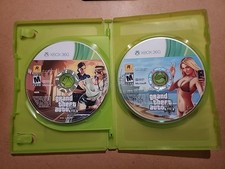 Grand Theft Auto V (2 discos XBOX 360) sem estojo manual ou original. Disco Just The 2 comprar usado Grand Theft Auto V (2 discos XBOX 360) sem estojo manual ou original. Disco Just The 2 comprar usado  Enviando para Brazil