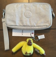 Organizador de Carteira Kipling Wristlet Cinza com Chaveiro Macaco Amarelo SVEN Novo, usado comprar usado  Enviando para Brazil
