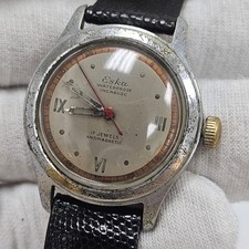 ESKA VINTAGE SCREWBACK AÇO 17J VENTO MANUAL LINDO MOSTRADOR ROMANO DE 2 TONS comprar usado  Enviando para Brazil