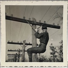 Man climbing telephone for sale  Carlsbad