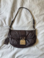 Vintage brązowa skórzana torba na ramię DKNY. Srebrne zapięcie i okucia. Paski na klamrę na sprzedaż  Wysyłka do Poland