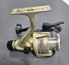 Molinete giratório Daiwa Long Cast Rear Drag PG1355 BL comprar usado  Enviando para Brazil