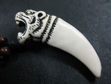 Collana uomo dente usato  Due Carrare