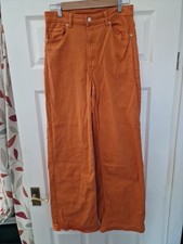 Mens flared orange for sale  MARKET HARBOROUGH