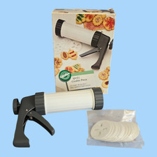 Pistola de prensa de biscoitos Wilton Spritz e 12 designs de biscoitos de plástico gatilho fácil de apertar comprar usado  Enviando para Brazil