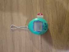 Tamagotchi verde bandai usato  Quartu Sant Elena