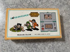 Juego y reloj vintage Nintendo Bomb Sweeper juego electrónico portátil 1987 segunda mano  Embacar hacia Mexico