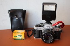 Câmera de Programa Canon AE-1 Analógica com Lente 50mm F/1.8 FD e Flash Speedlite 177A comprar usado Câmera de Programa Canon AE-1 Analógica com Lente 50mm F/1.8 FD e Flash Speedlite 177A comprar usado  Enviando para Brazil