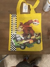 Sacola de compras Donkey Kong Mario Kart Wii não usada 2009 etiqueta ouro amarelo comprar usado  Enviando para Brazil