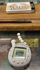 Bandai Tamagotchi 2004 animal de estimação virtual branco comprar usado  Enviando para Brazil