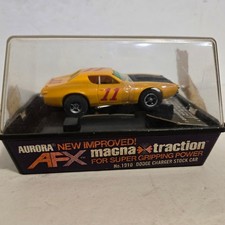 Carro de autorama AFX 1910 Dodge Charger Stock Car HO. Ainda com faixas. Novo. Não testado. Como está comprar usado Carro de autorama AFX 1910 Dodge Charger Stock Car HO. Ainda com faixas. Novo. Não testado. Como está comprar usado  Enviando para Brazil