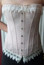 Corset beige rosé d'occasion  Guebwiller