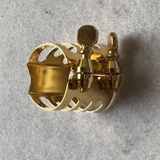Pince ligature saxophone d'occasion Pince ligature saxophone d'occasion  Expédié en France