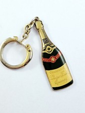 Porte cles champagne d'occasion Porte cles champagne d'occasion  L'Absie