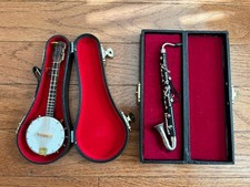 Dois instrumentos musicais em miniatura saxofone alto e banjo 5” em estojos, usado comprar usado  Enviando para Brazil