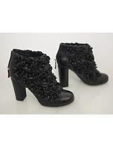 Chanel black camellia usato  Sondrio