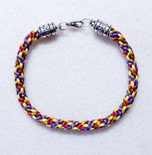 Bracelet tresse kumihimo d'occasion  Roquebrune-sur-Argens