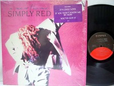 SIMPLY RED - A New Flame LP (1989 US Pressing on ELEKTRA, in Shrink) comprar usado SIMPLY RED - A New Flame LP (1989 US Pressing on ELEKTRA, in Shrink) comprar usado  Enviando para Brazil