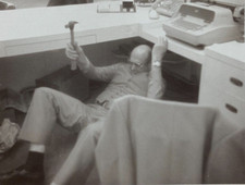 Man holding hammer for sale  Foley