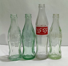 Antiguo lote de cuatro botellas de Coca-Cola de 1986 escritura árabe en excelente estado, usado segunda mano  Embacar hacia Argentina