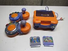 Sistema de aprendizaje de TV Vtech Vsmile con 2 controladores y 2 juegos - Probado segunda mano  Embacar hacia Argentina