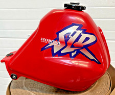 Réservoir rouge honda d'occasion  Vénissieux
